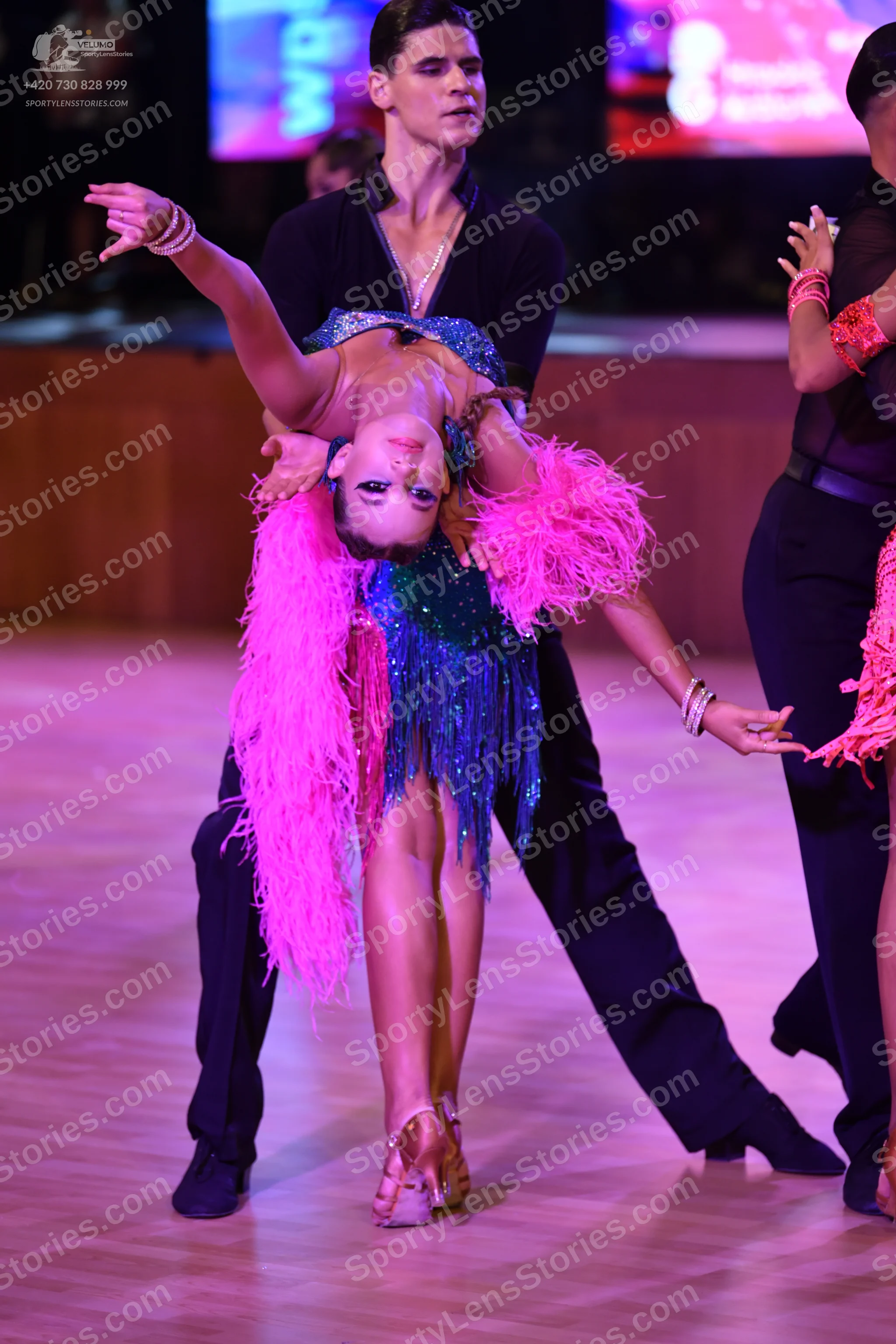 Dancesport competitor: ** Red Latin dress