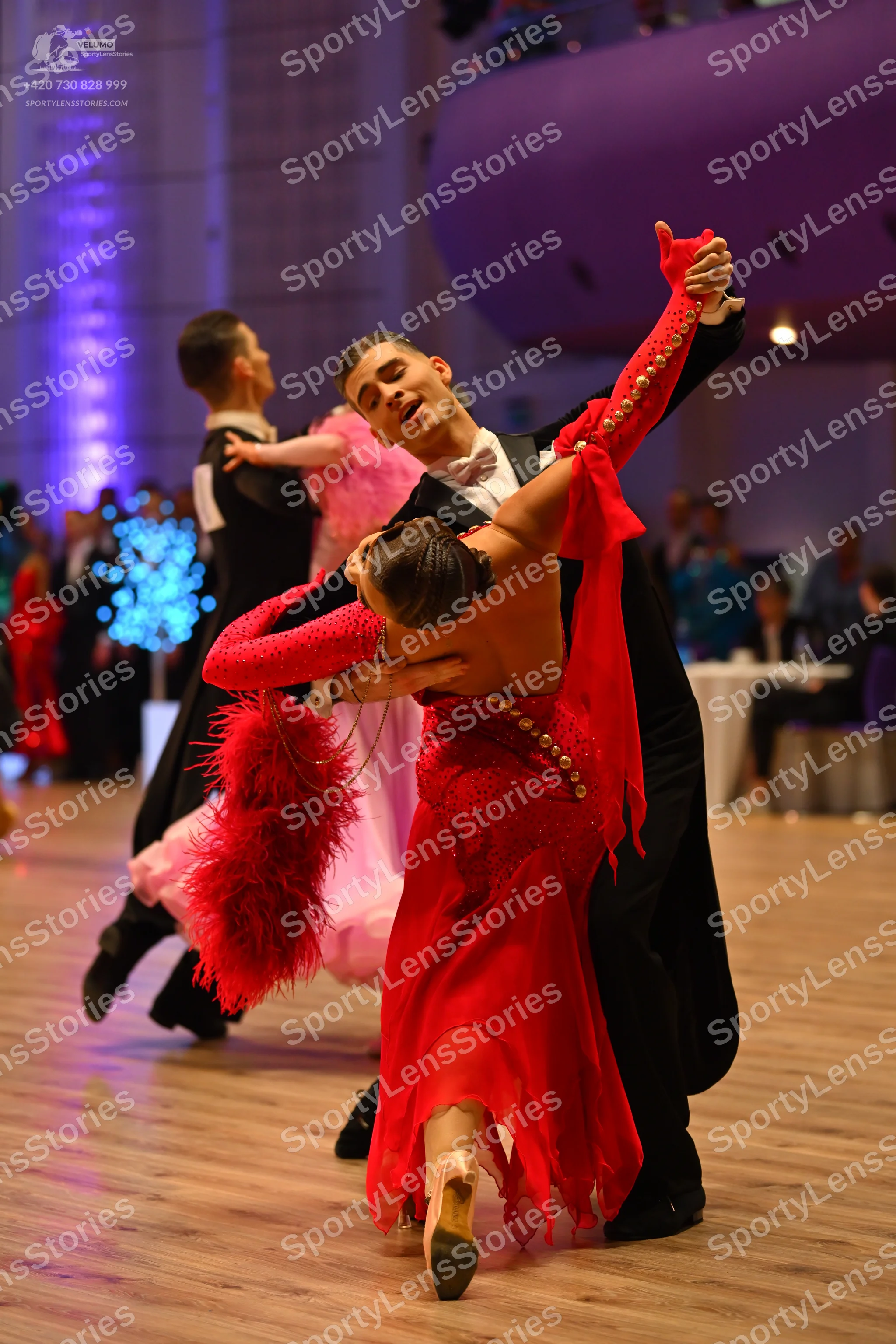 Dancesport competitor: Male dancer 1: black suit and white shirt