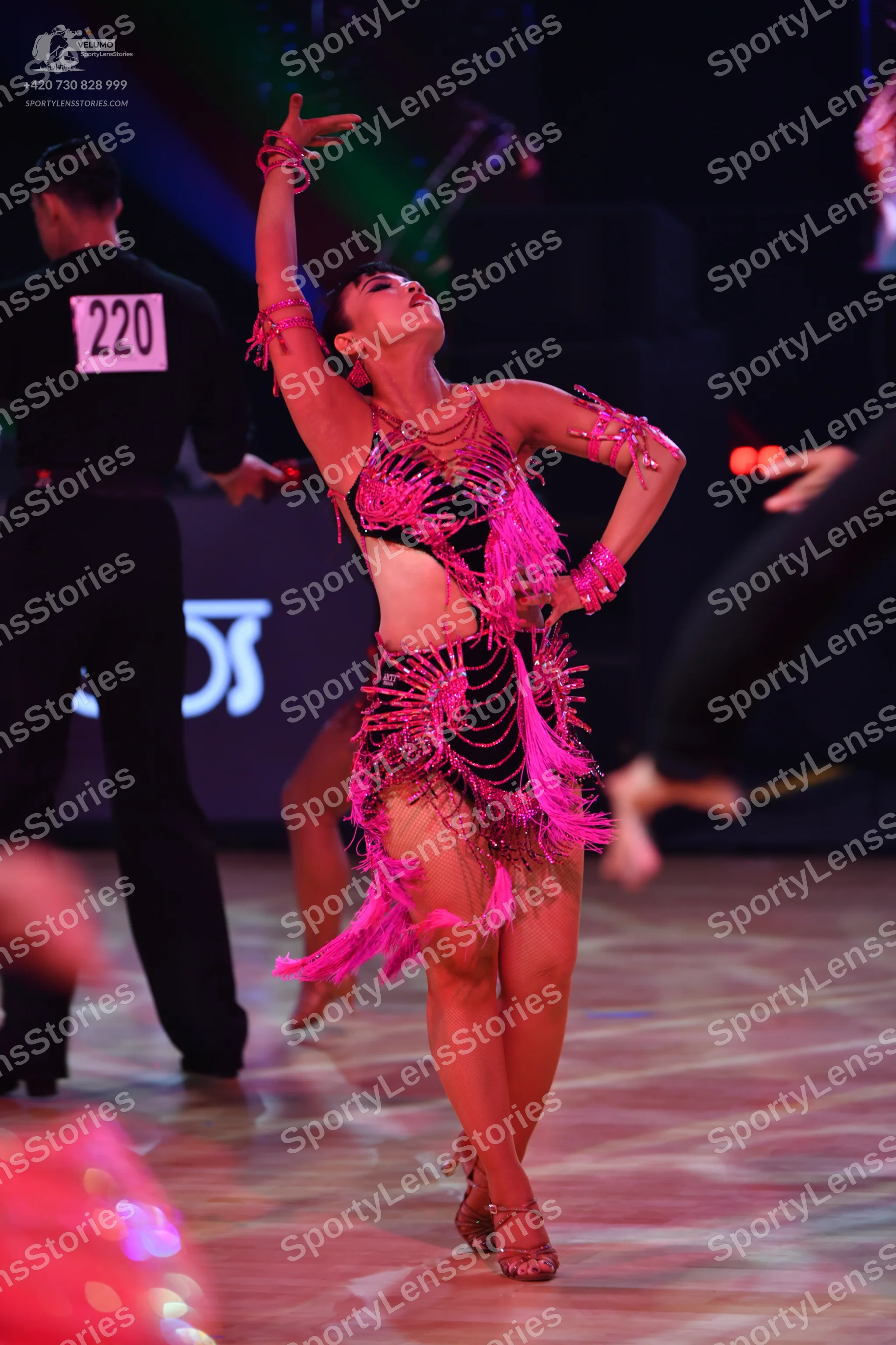 Dancesport competitor: Male dancer: black long-sleeved top and black trousers