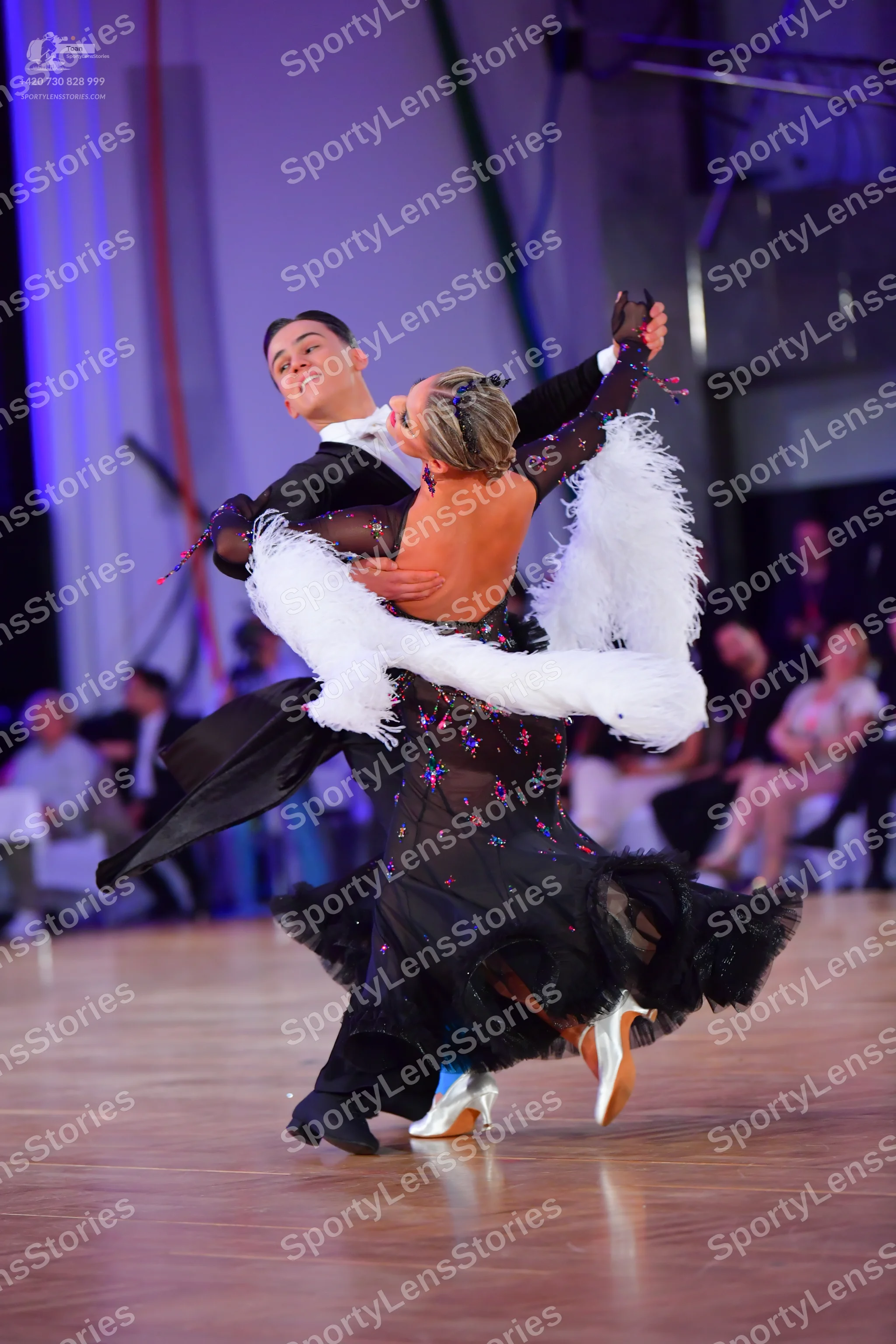 Dancesport competitor: Male dancer: black long-sleeved dance shirt and black trousers