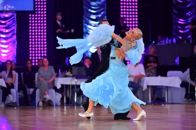 Dancesport competitor: Male dancer: black dance outfit
