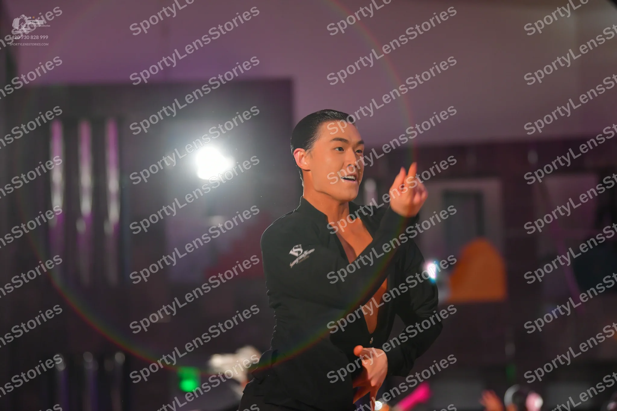 Dancesport competitor: Male dancer: black long-sleeved dance shirt
