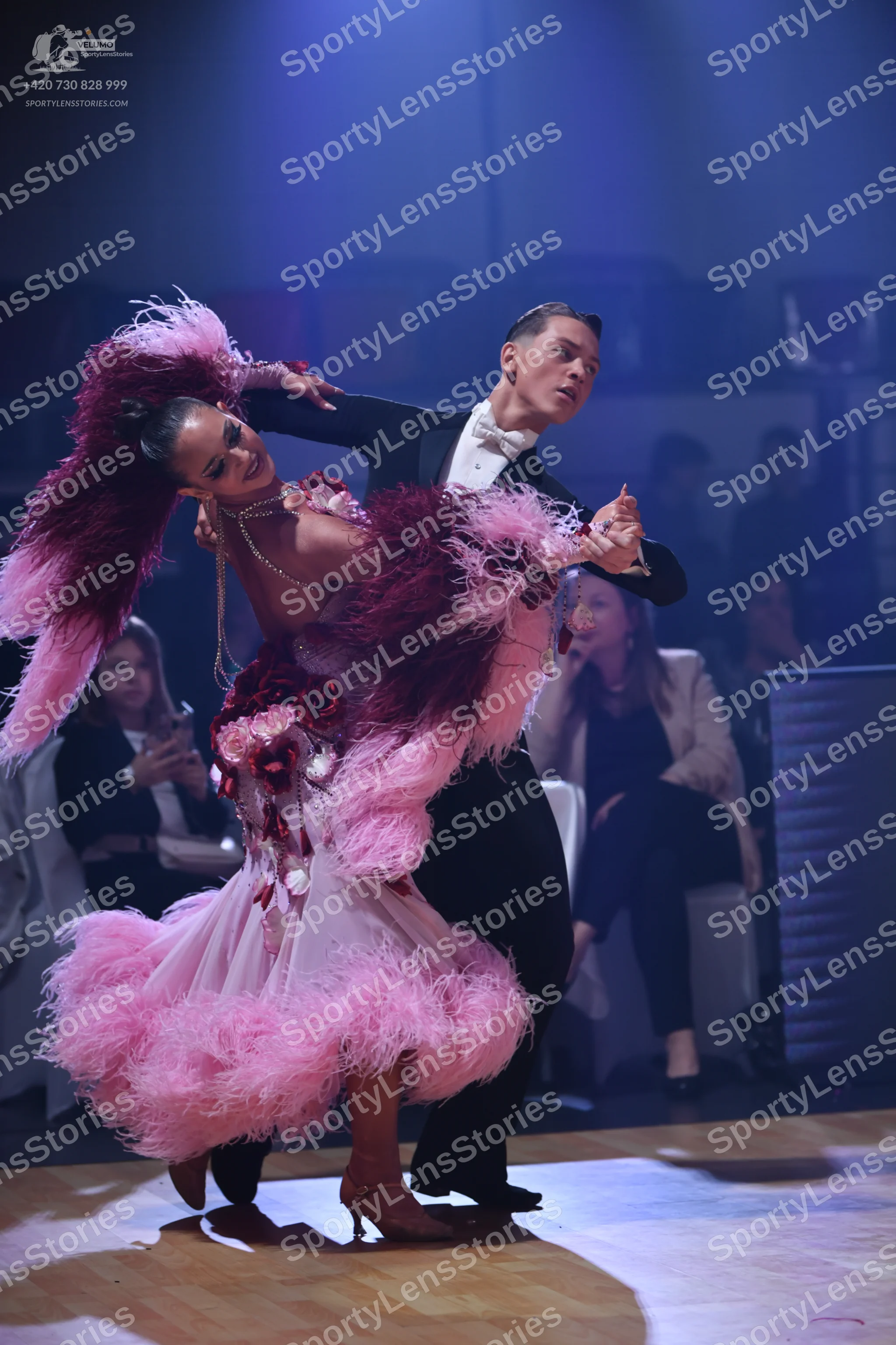 Dancesport competitor: Male dancer: black suit with white shirt and white bowtie