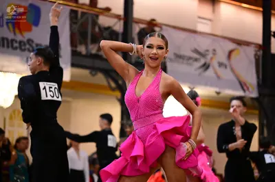 Dancesport competitor #150: Male dancer: black long-sleeved shirt and trousers