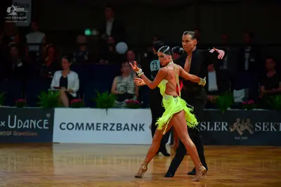 Dancesport competitor #73: Female dancer: lime green latin dress with fringe