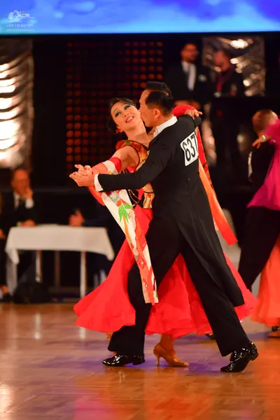 Dancesport competitor #637: Male dancer: black ballroom suit with a white shirt