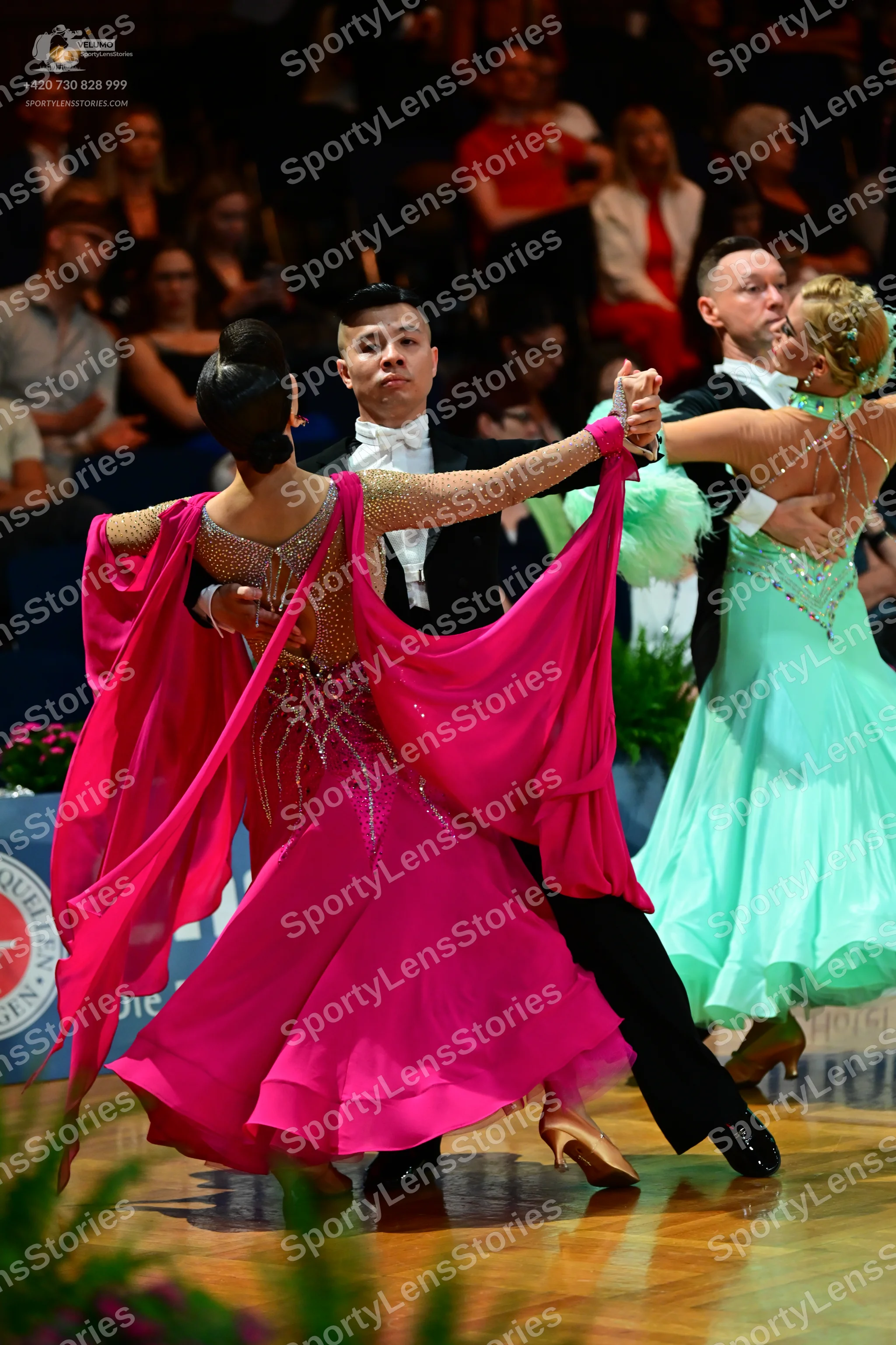 Dancesport competitor: Male dancer 1: black suit with a white shirt and white bowtie