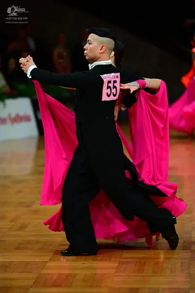 Dancesport competitor #55: Male dancer: black long-sleeved top and black trousers