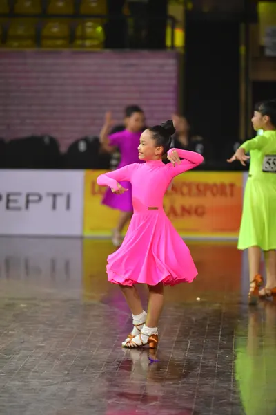 Dancesport competitor #166: Lime green dancer: lime green latin dress
