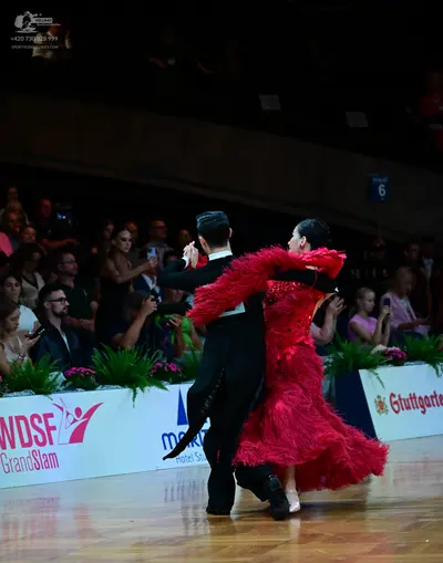 Dancesport competitor: Male dancer: black tailcoat and trousers