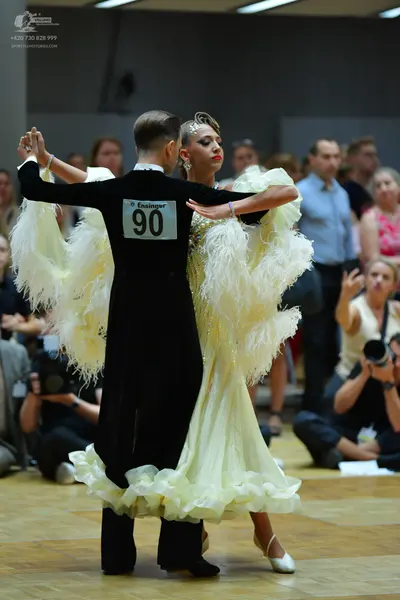 Dancesport competitor #90: Male dancer: black long-sleeved top and black trousers