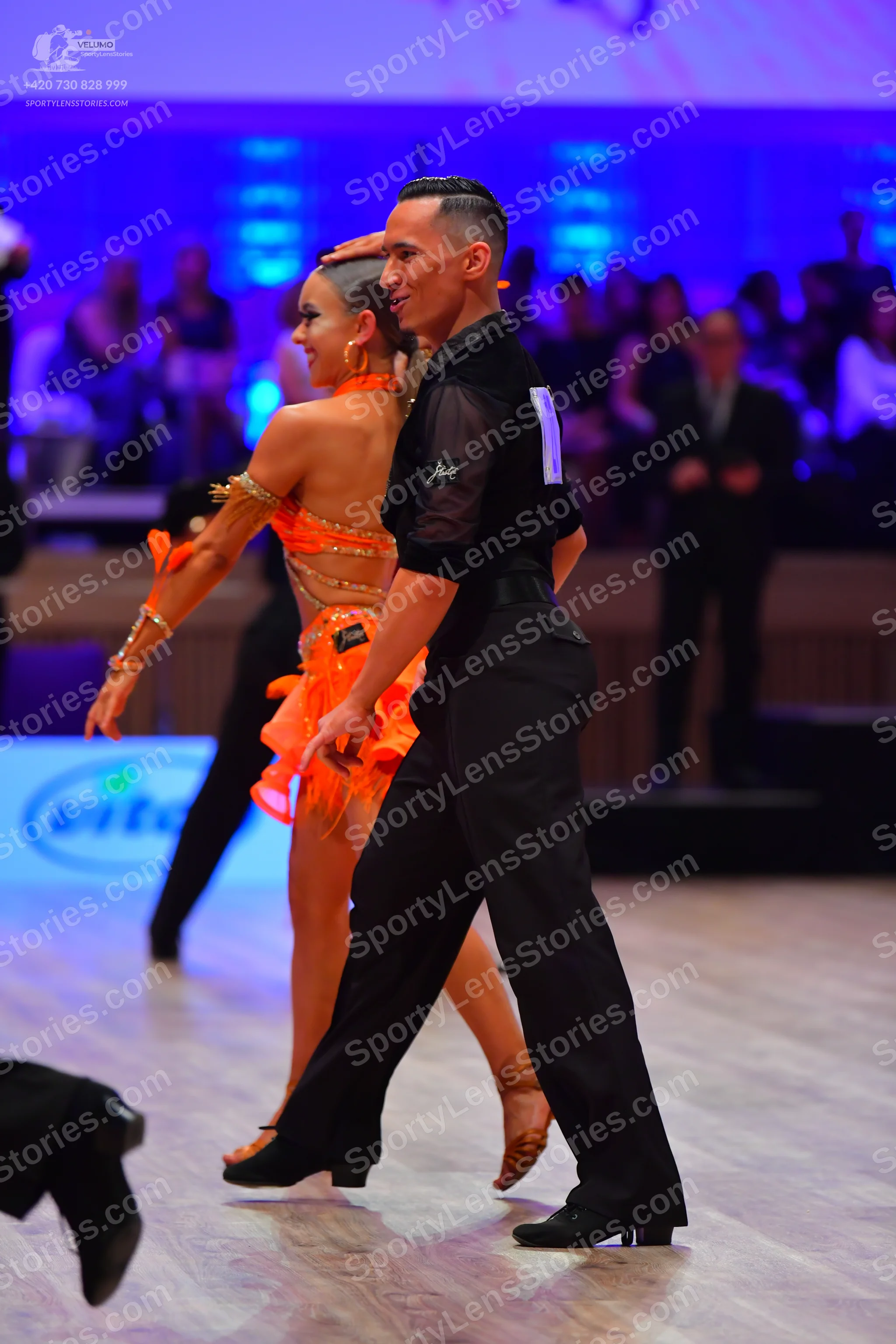 Dancesport competitor: Male dancer: black long-sleeved shirt and black trousers