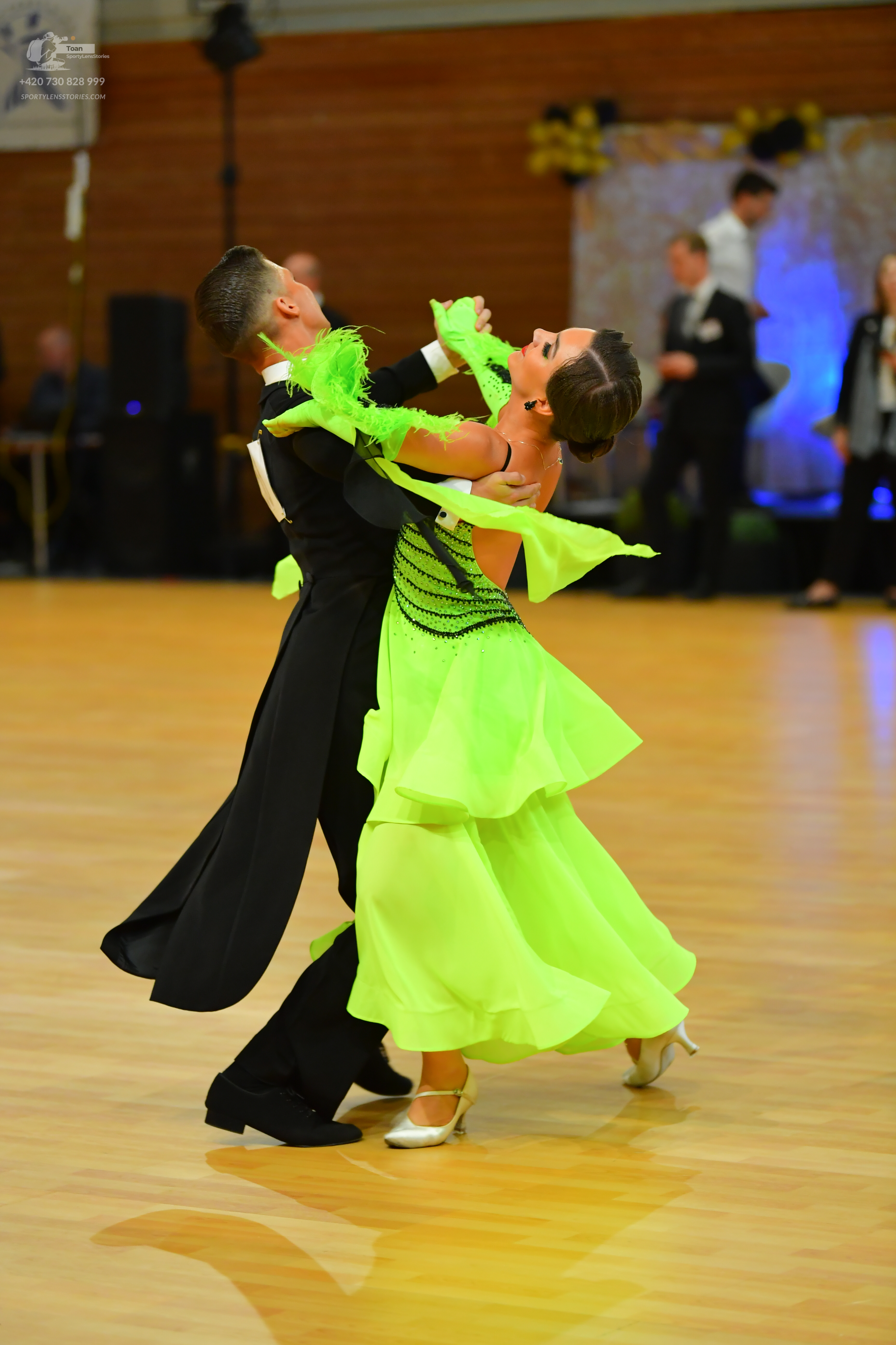 Dancesport competitor: Male dancer: black ballroom tailcoat with a white shirt