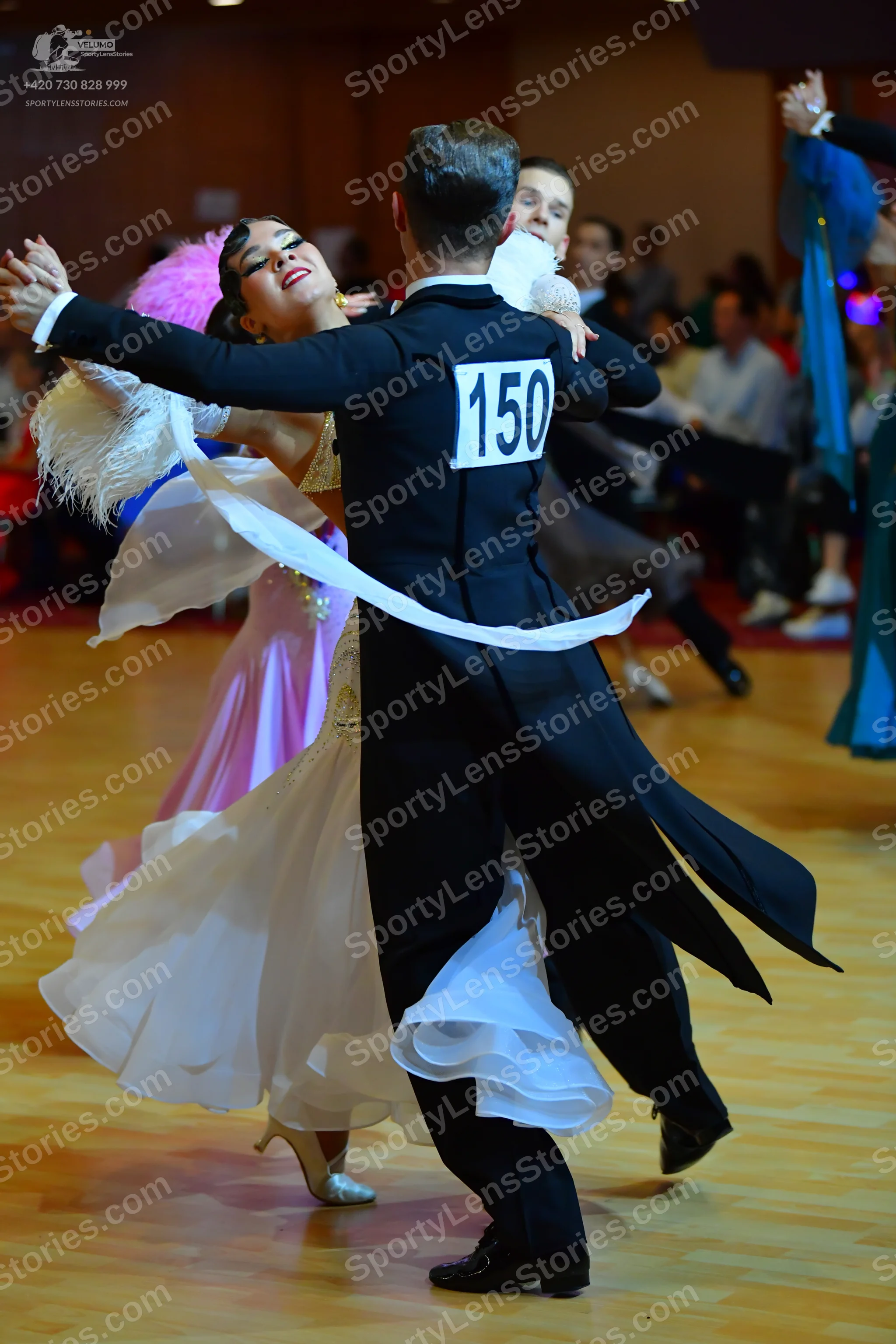 Dancesport competitor #150: Male dancer: black ballroom suit with a white shirt