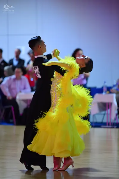 Dancesport competitor #274: Male dancer: black long-sleeved shirt and black trousers