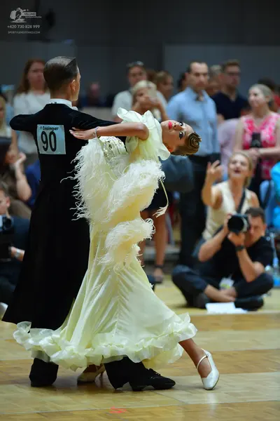 Dancesport competitor #90: Male dancer: black long-sleeved dance suit