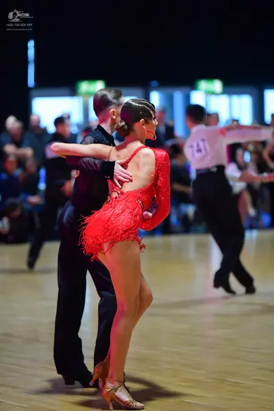 Dancesport competitor #74: Female dancer: red latin dress with sequins and fringe