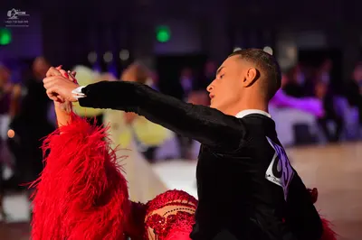 Dancesport competitor #93: Male dancer: black long-sleeved top
