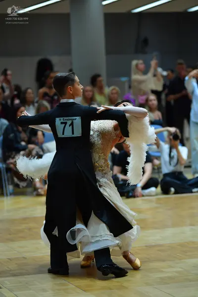 Dancesport competitor #71: Male dancer: black tailcoat