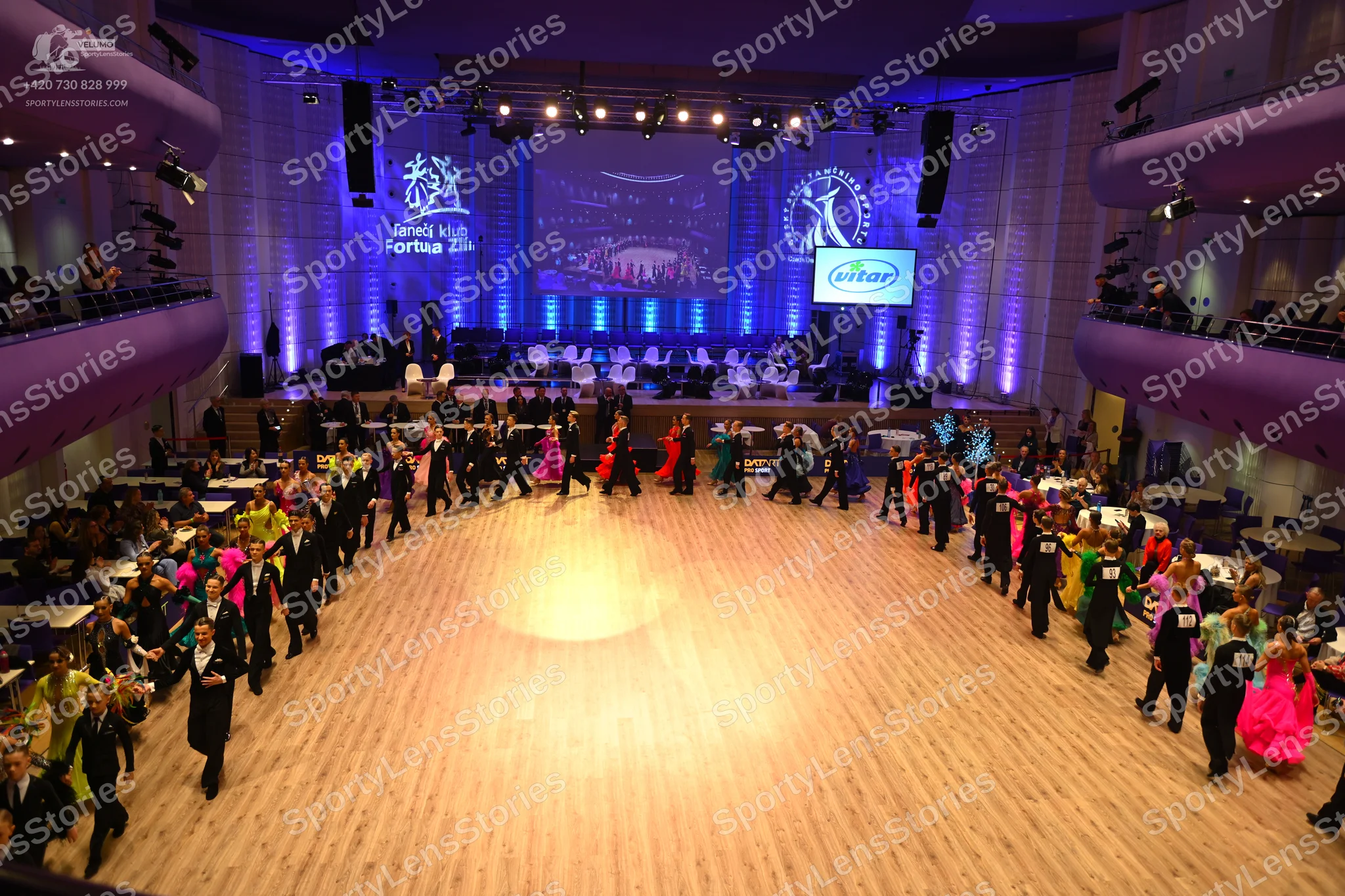 Dancesport competitor: Male dancers: black suits with white shirts and black bow ties or neckties