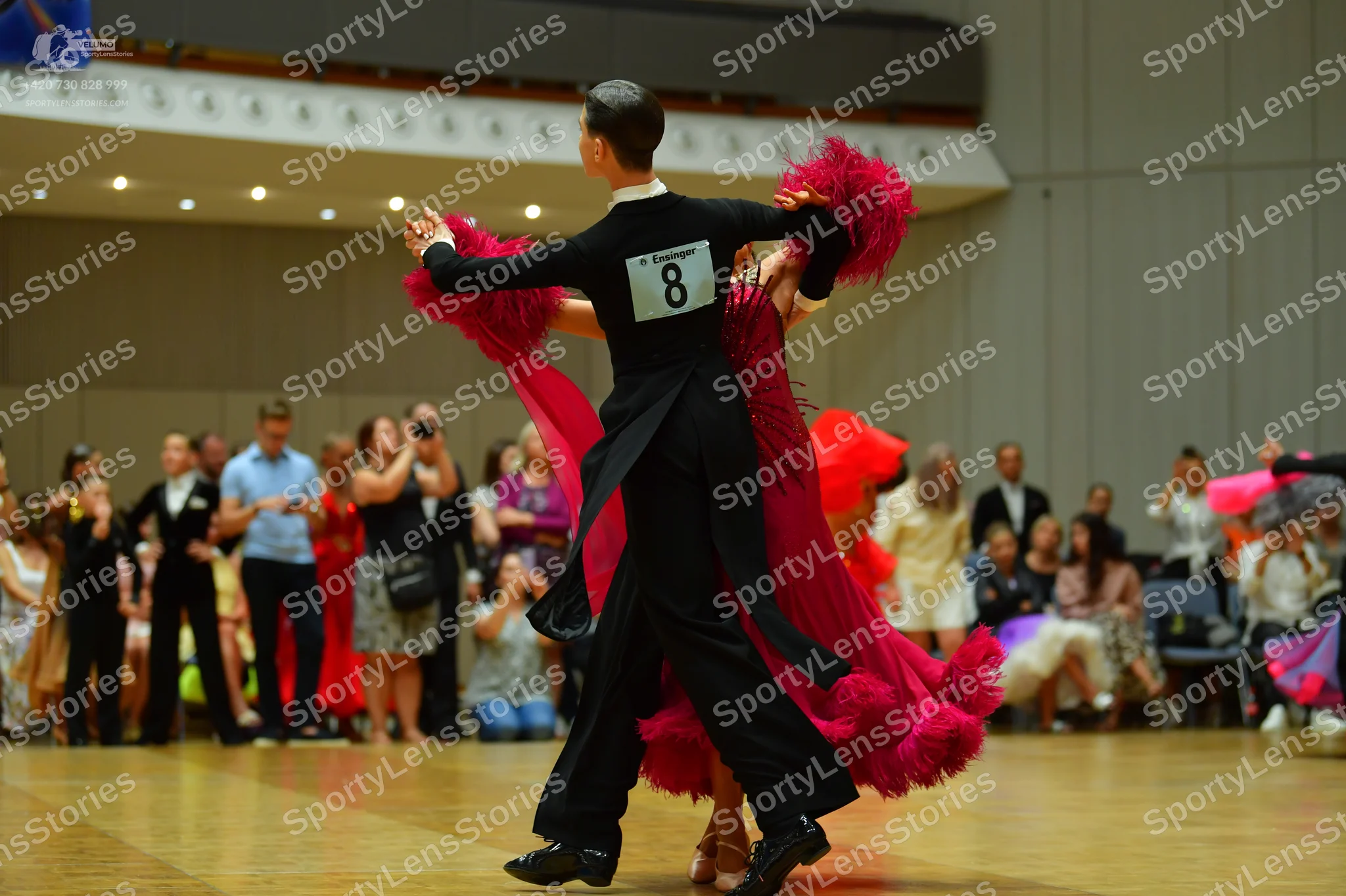 Dancesport competitor: Male dancer: black long-sleeved shirt and black trousers