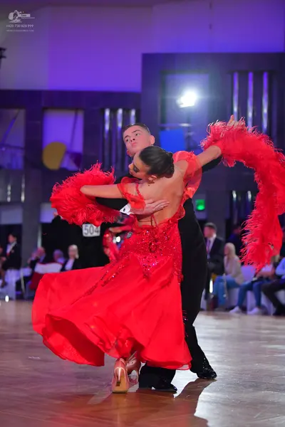Dancesport competitor #504: Male dancer: black suit