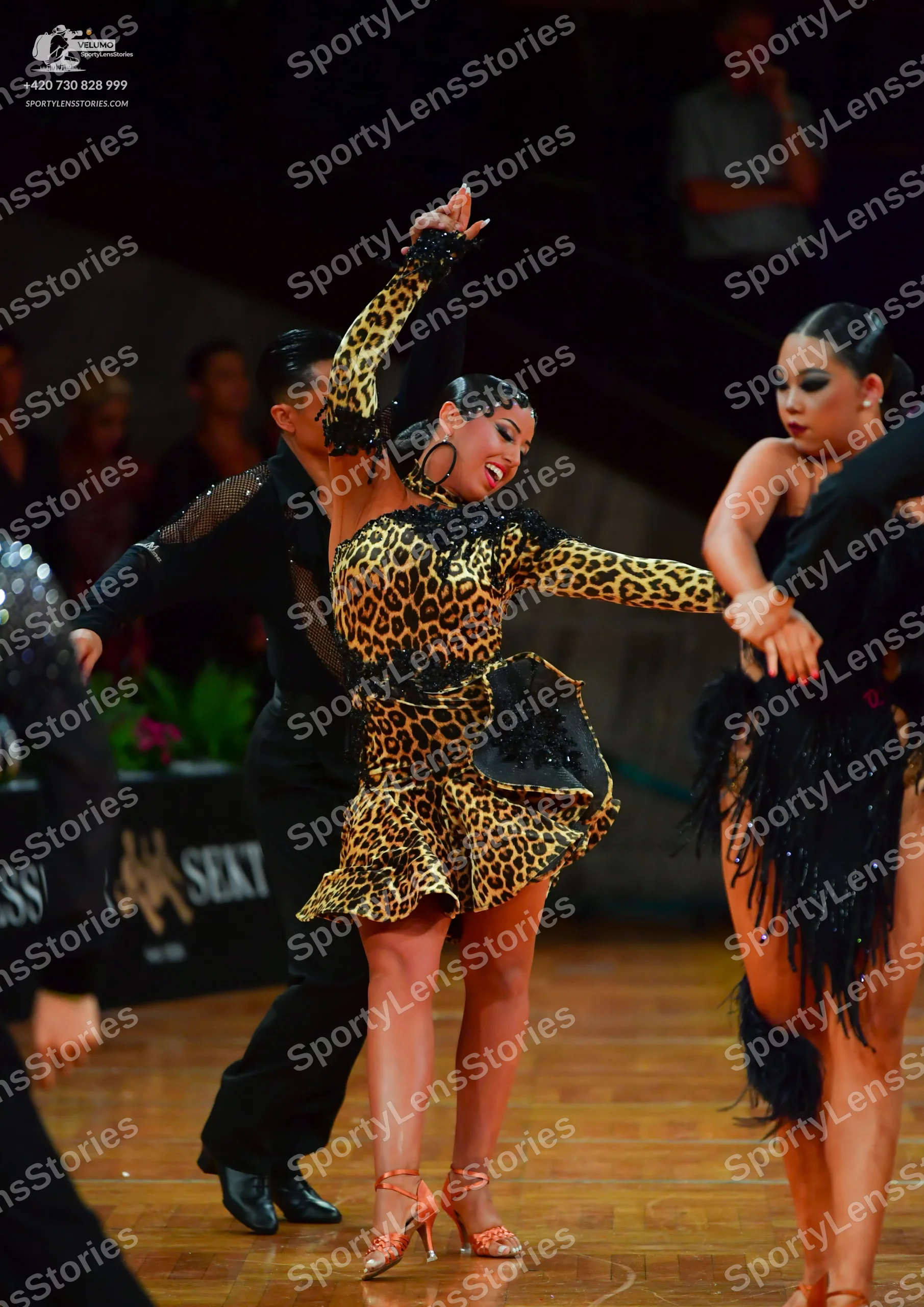 Dancesport competitor: Male dancer: black long-sleeved shirt with subtle sequins on the sleeve and blac