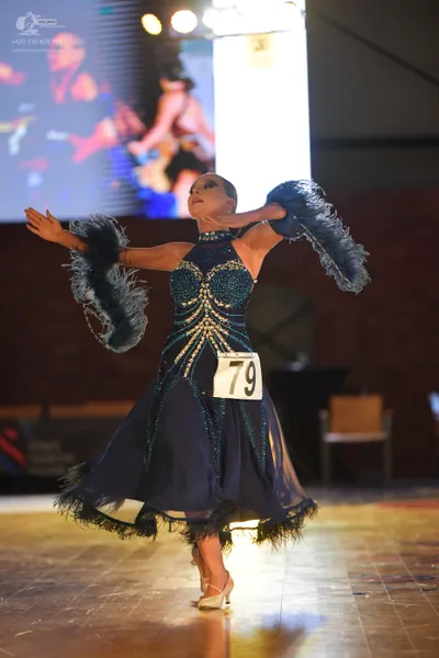 Dancesport competitor #79: Female dancer: navy blue latin dance dress with intricate sequin and beadwork on