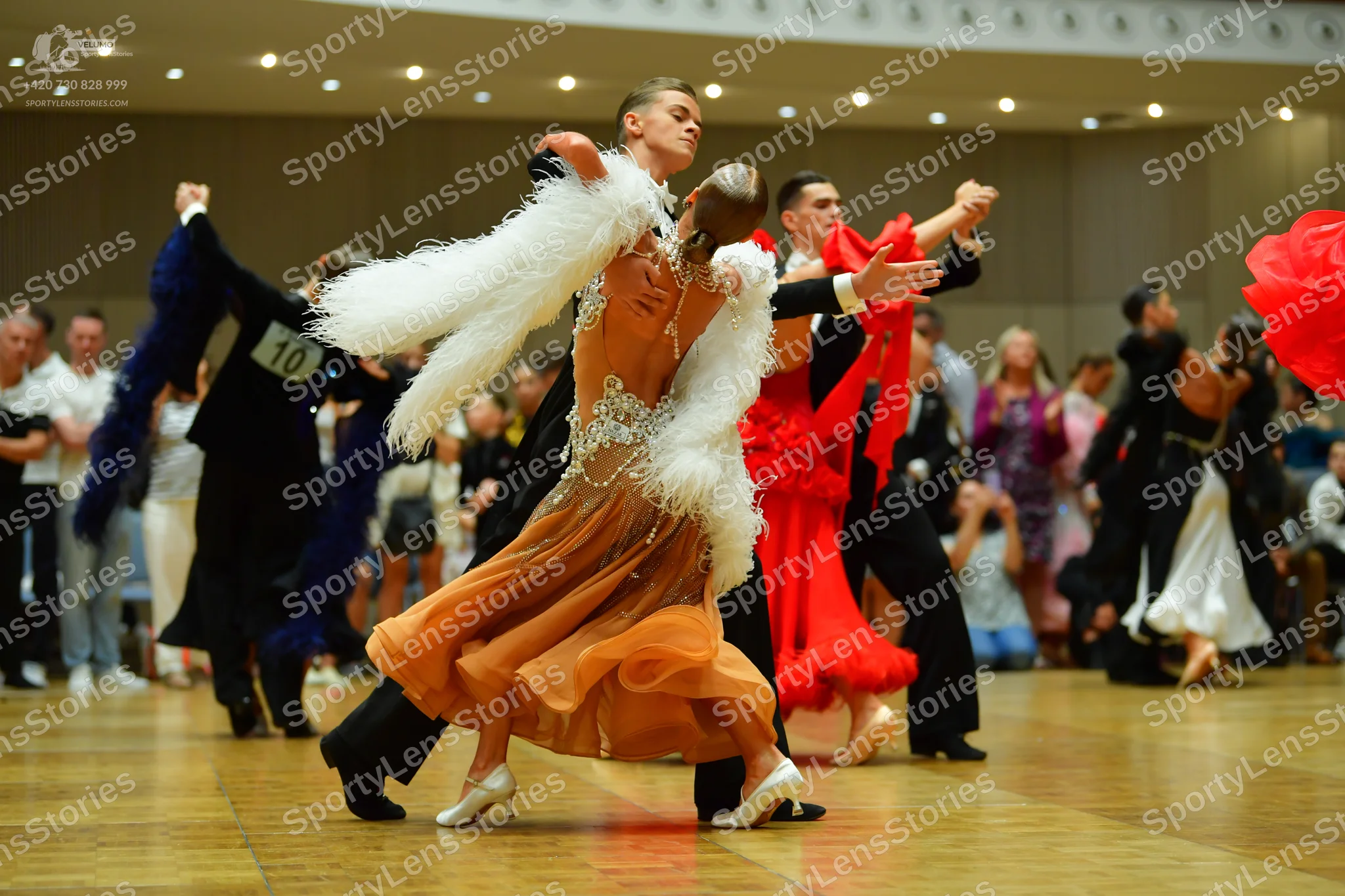 Dancesport competitor: Male dancer: black suit
