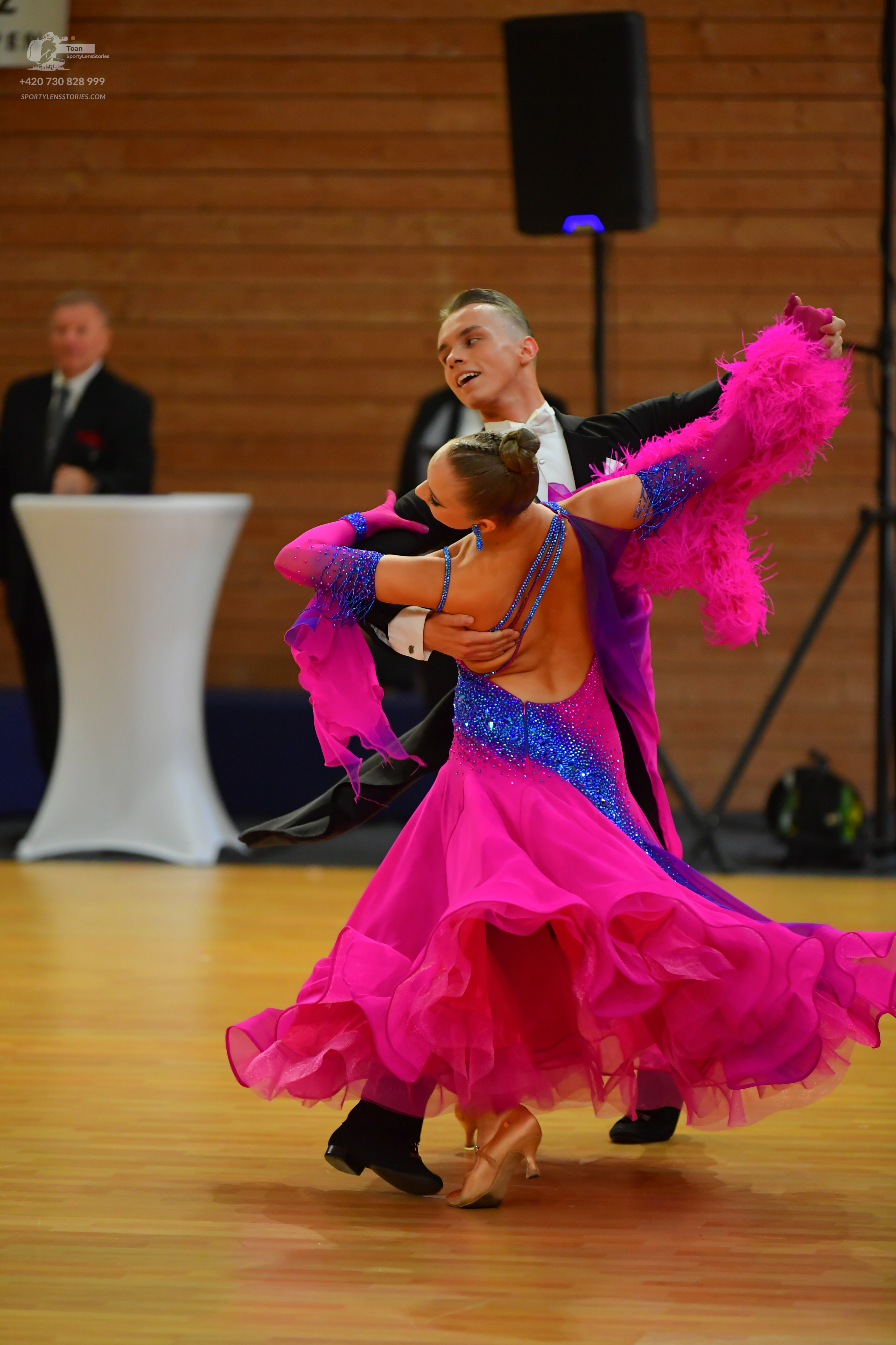 Dancesport competitor: Male** 
*   **Color:** Black
*   **Fabric:** Satin 
*   **Style:** Tail suit wit