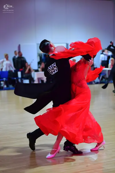 Dancesport competitor #695: Male dancer: black suit