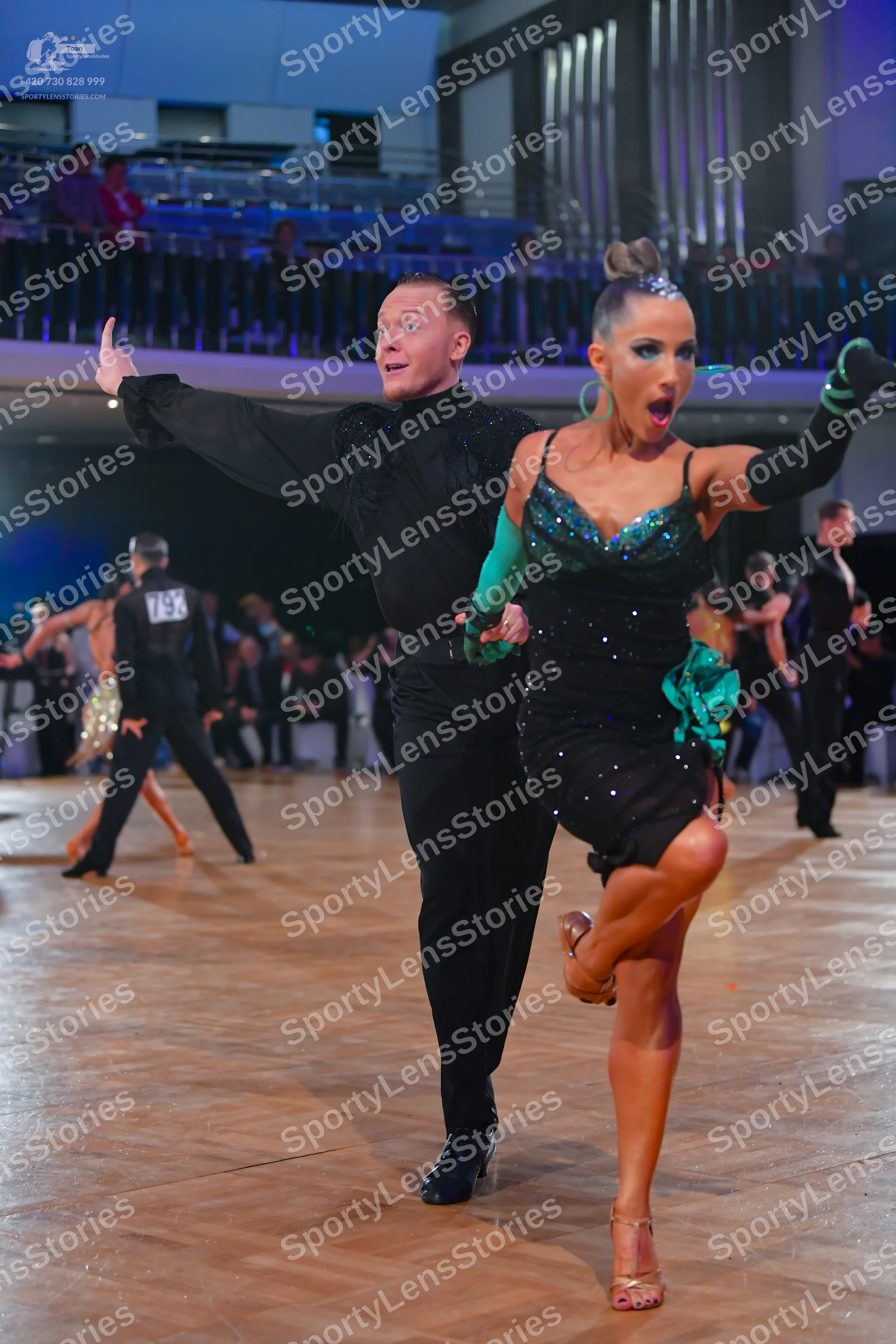 Dancesport competitor #73: Main male dancer: black long-sleeved shirt and black trousers
