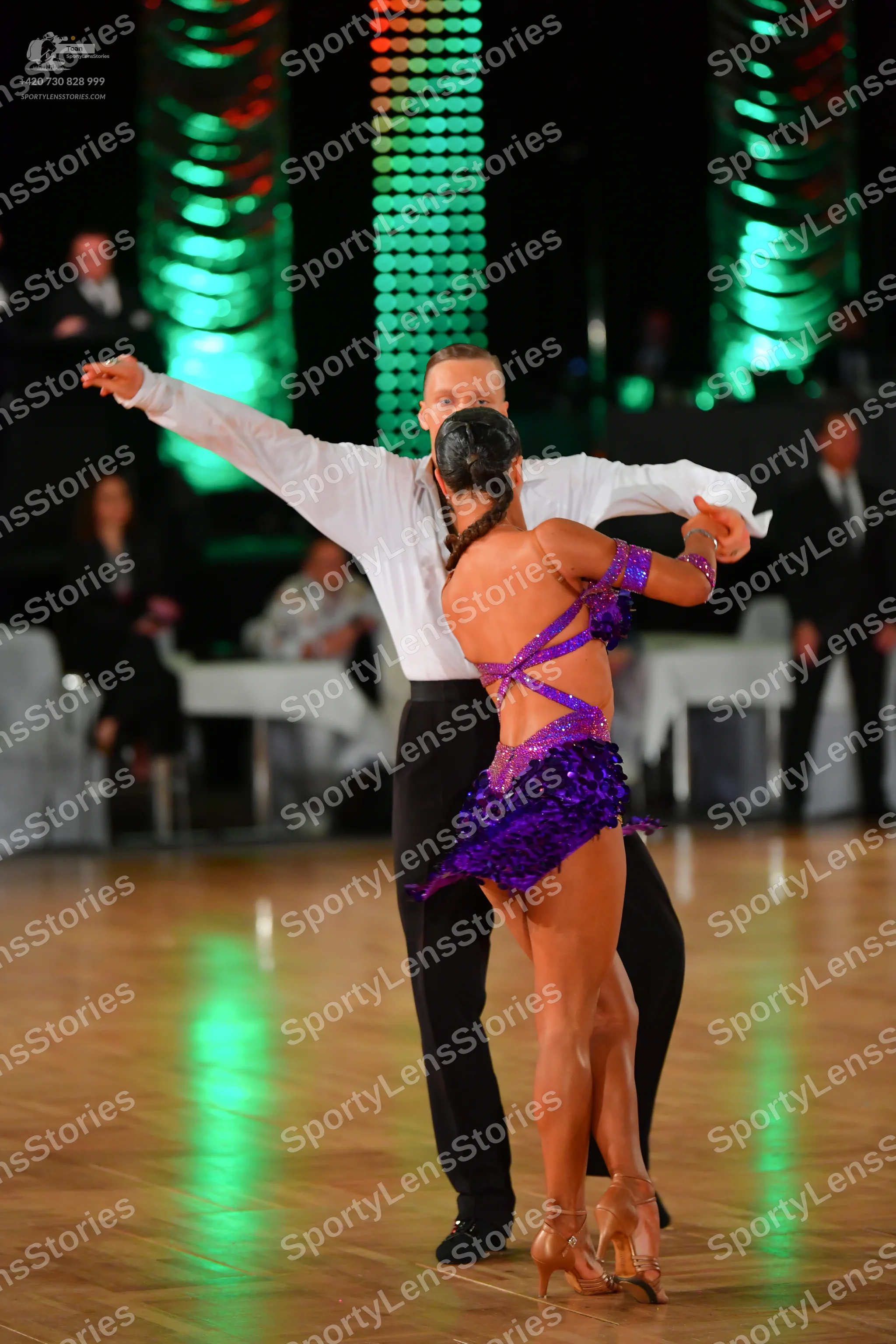 Dancesport competitor: Male dancer: white long-sleeved shirt and black trousers