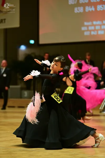 Dancesport competitor: ** Red Latin dress