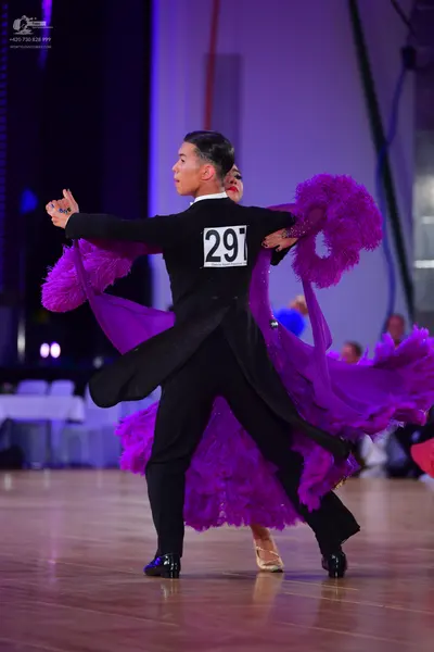 Dancesport competitor #291: Male dancer: black ballroom suit with a long tailcoat