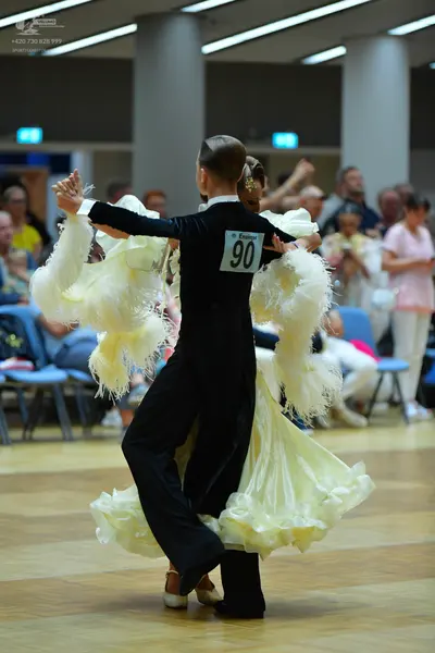 Dancesport competitor #90: Male dancer: black suit