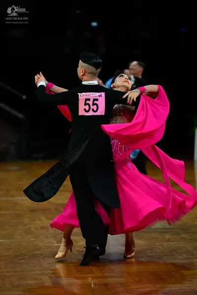 Dancesport competitor #55: Male dancer: black ballroom tailcoat