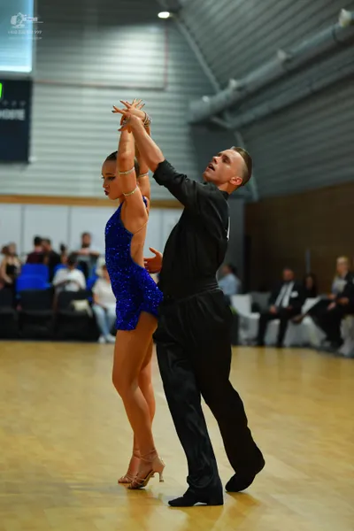 Dancesport competitor #999: Male** - Black tailsuit with sequin lapels