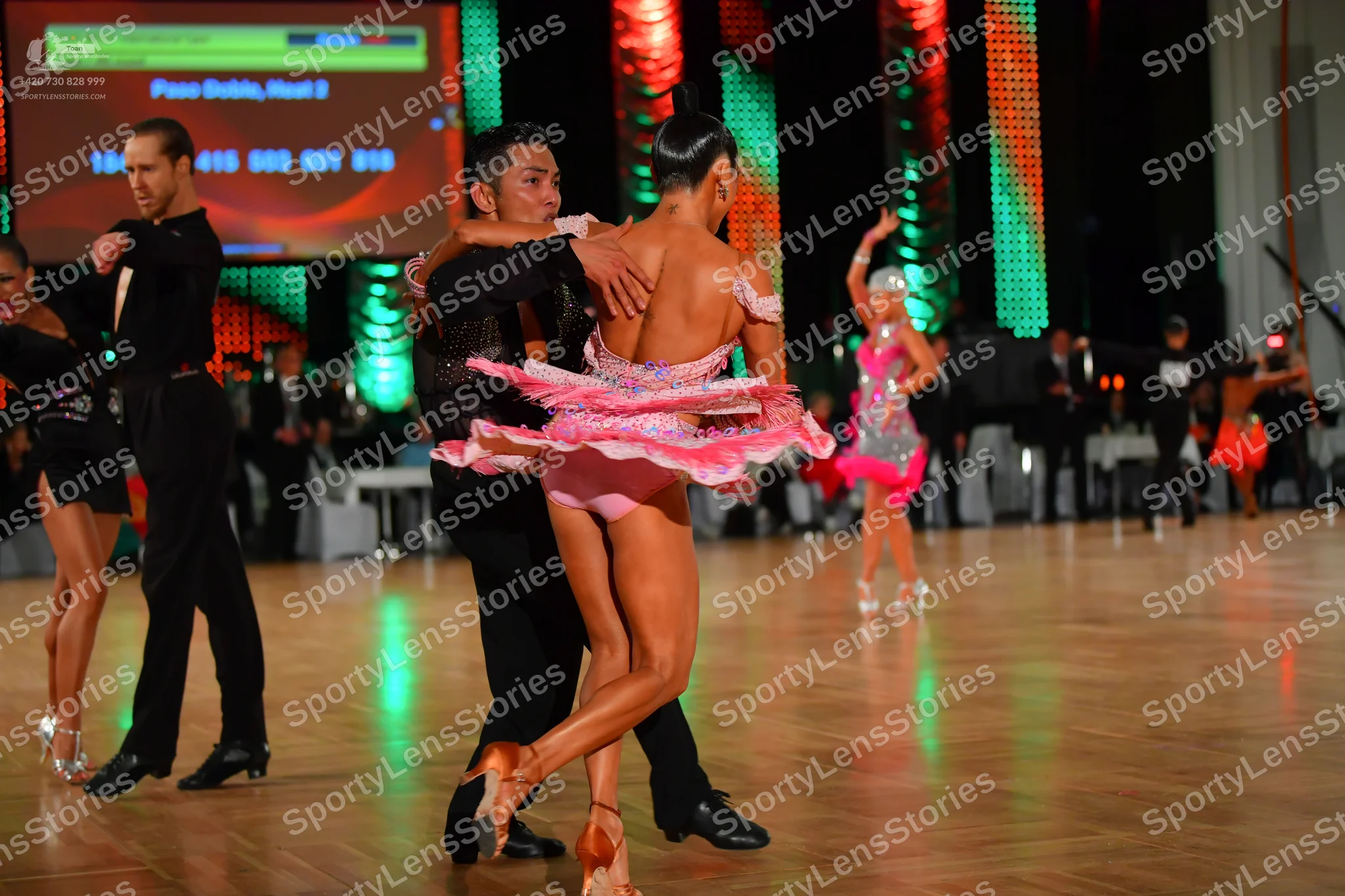 Dancesport competitor: Male dancers: black long-sleeved shirts and black trousers