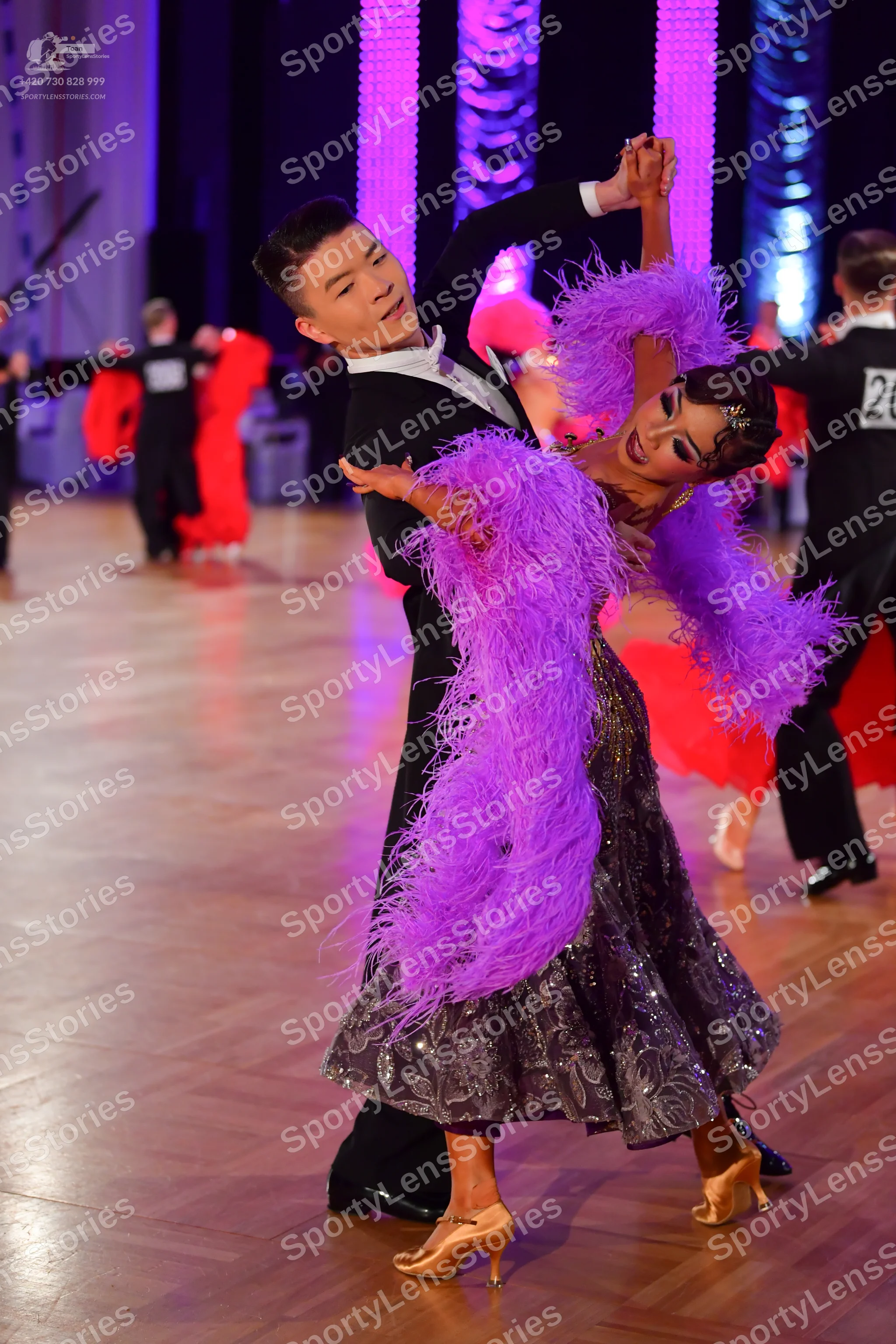 Dancesport competitor #20: Main male dancer: black suit with white shirt