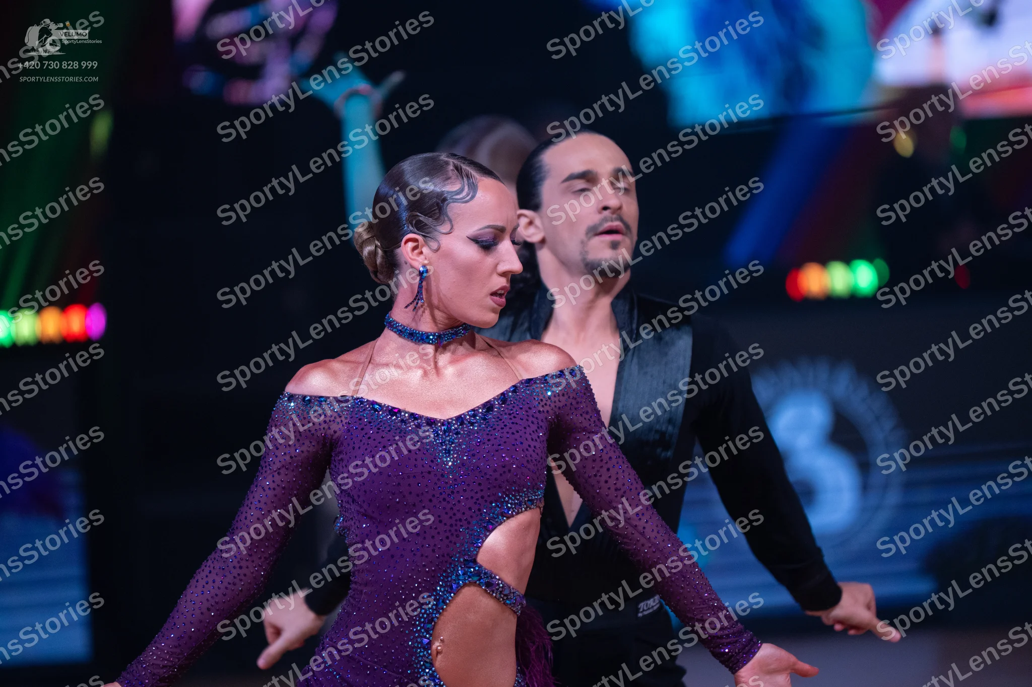 Dancesport competitor: Male dancer: black long-sleeved Latin dance shirt