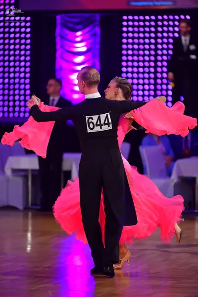 Dancesport competitor #644: Male dancer: black tailcoat suit with a white collar