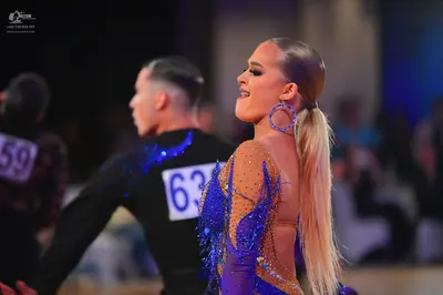 Dancesport competitor #59, #636: Male dancer (left): black costume