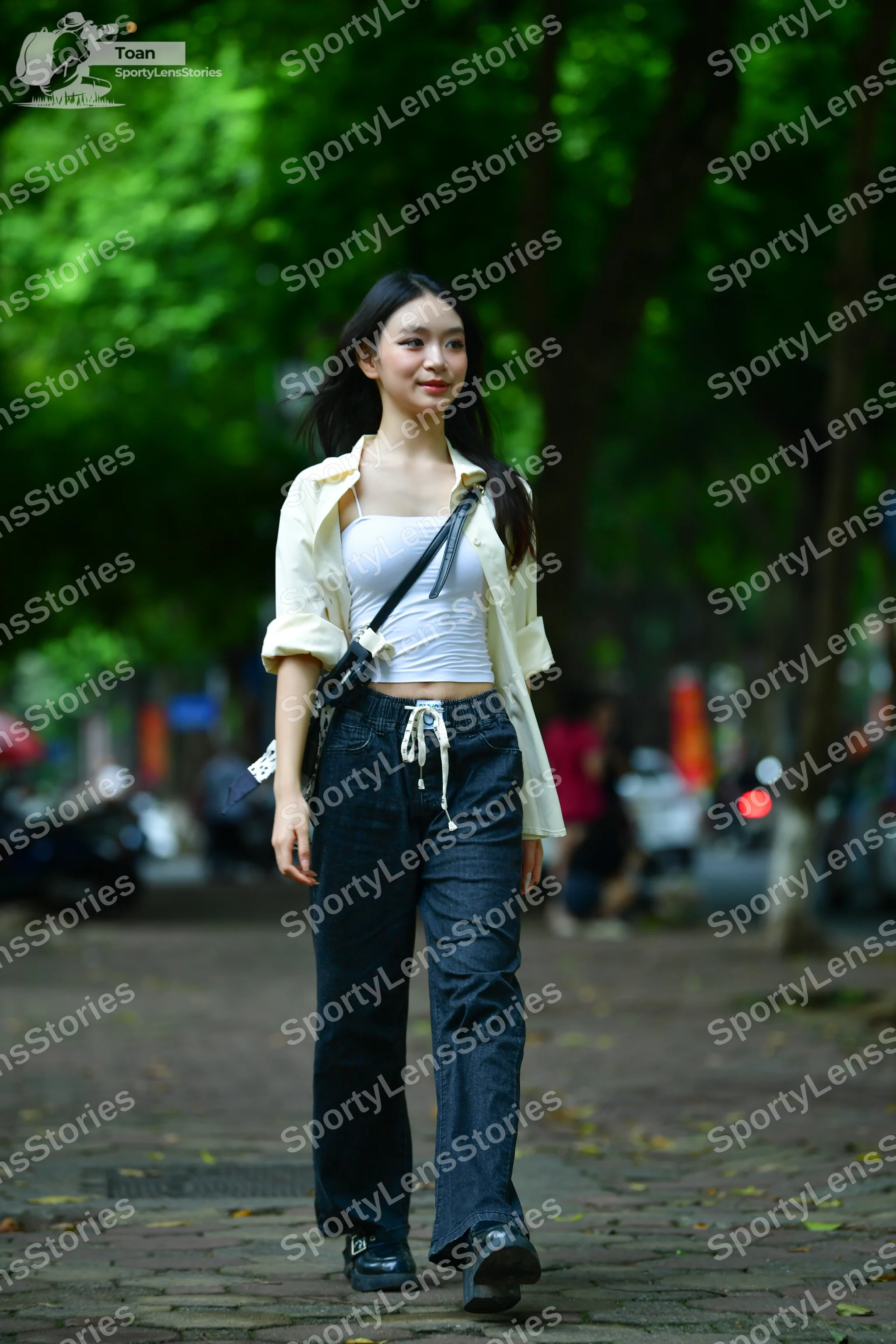 Dancesport competitor: There are no dancers in competition costumes visible in the image