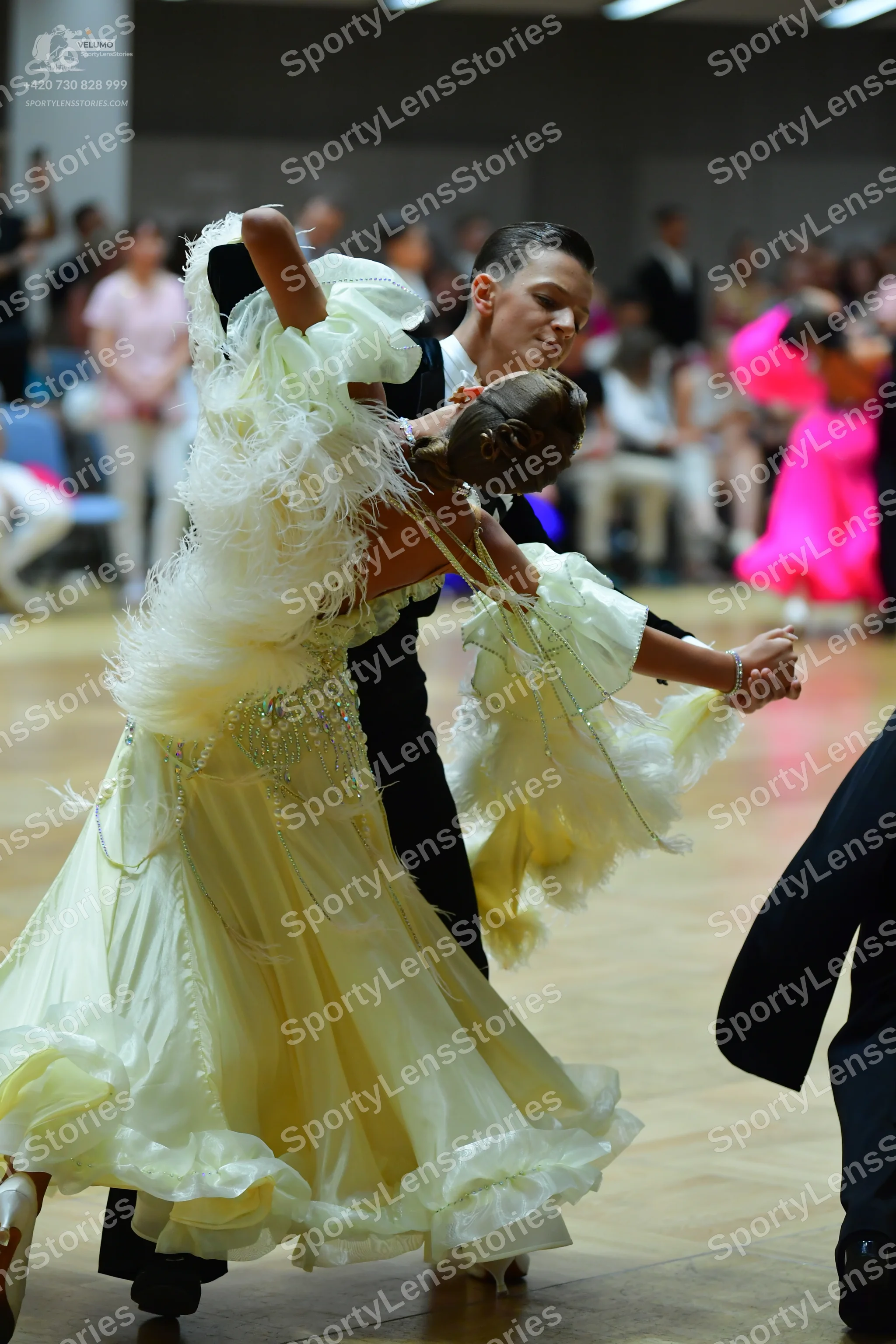 Dancesport competitor: Male dancer: black suit