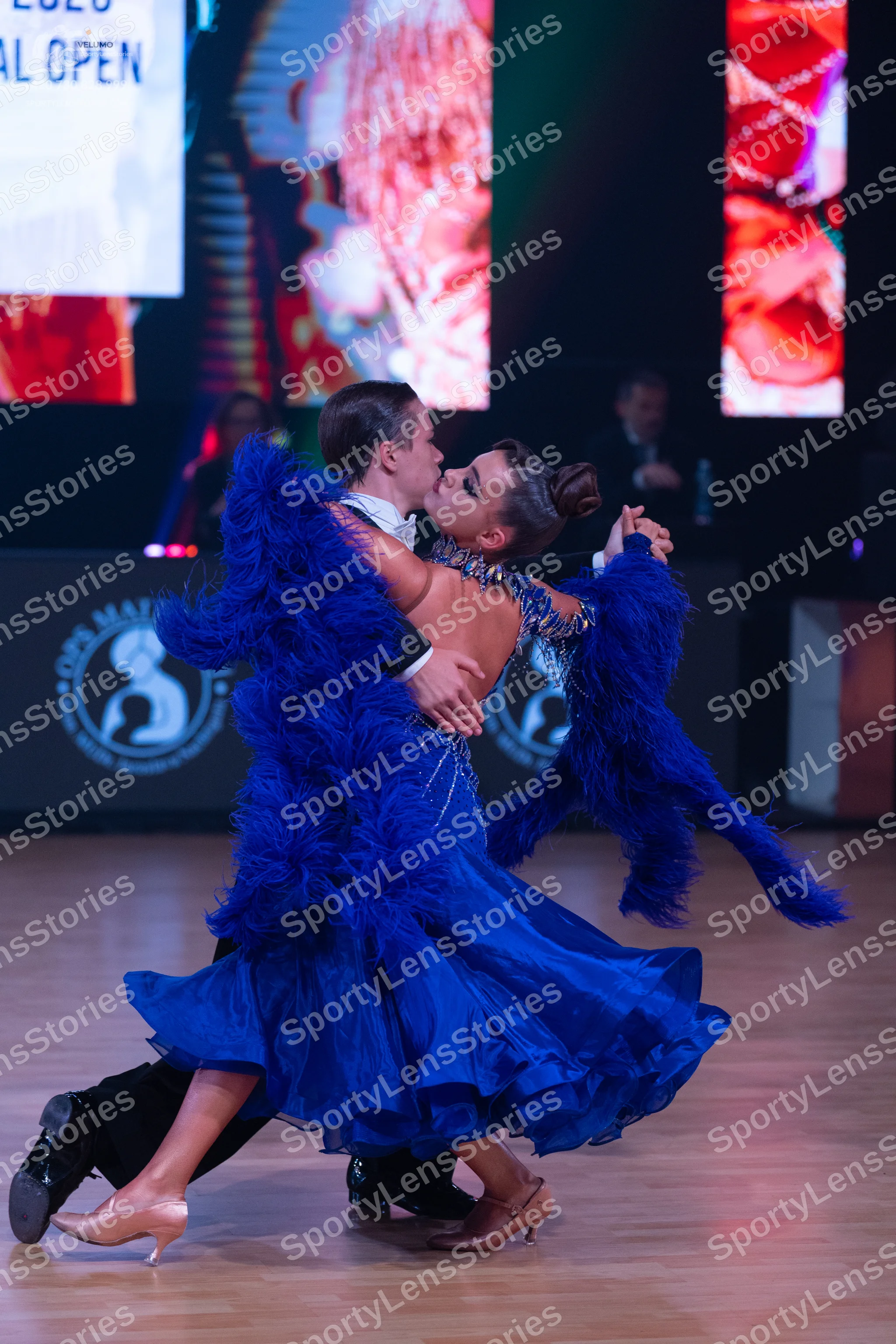 Dancesport competitor: Male dancer: black suit with a white shirt
