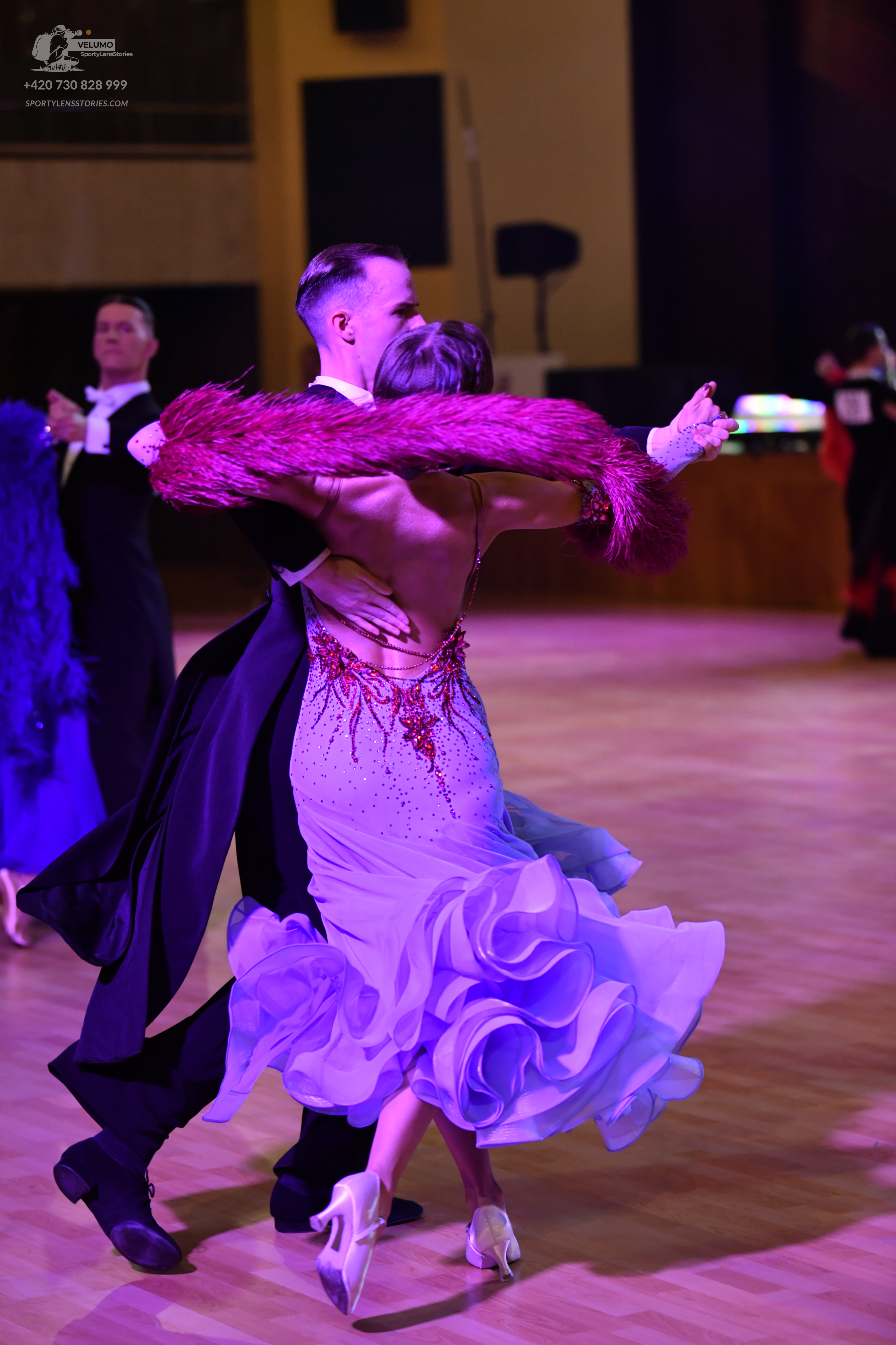 Dancesport competitor: Male dancer: black ballroom tailcoat with a white shirt