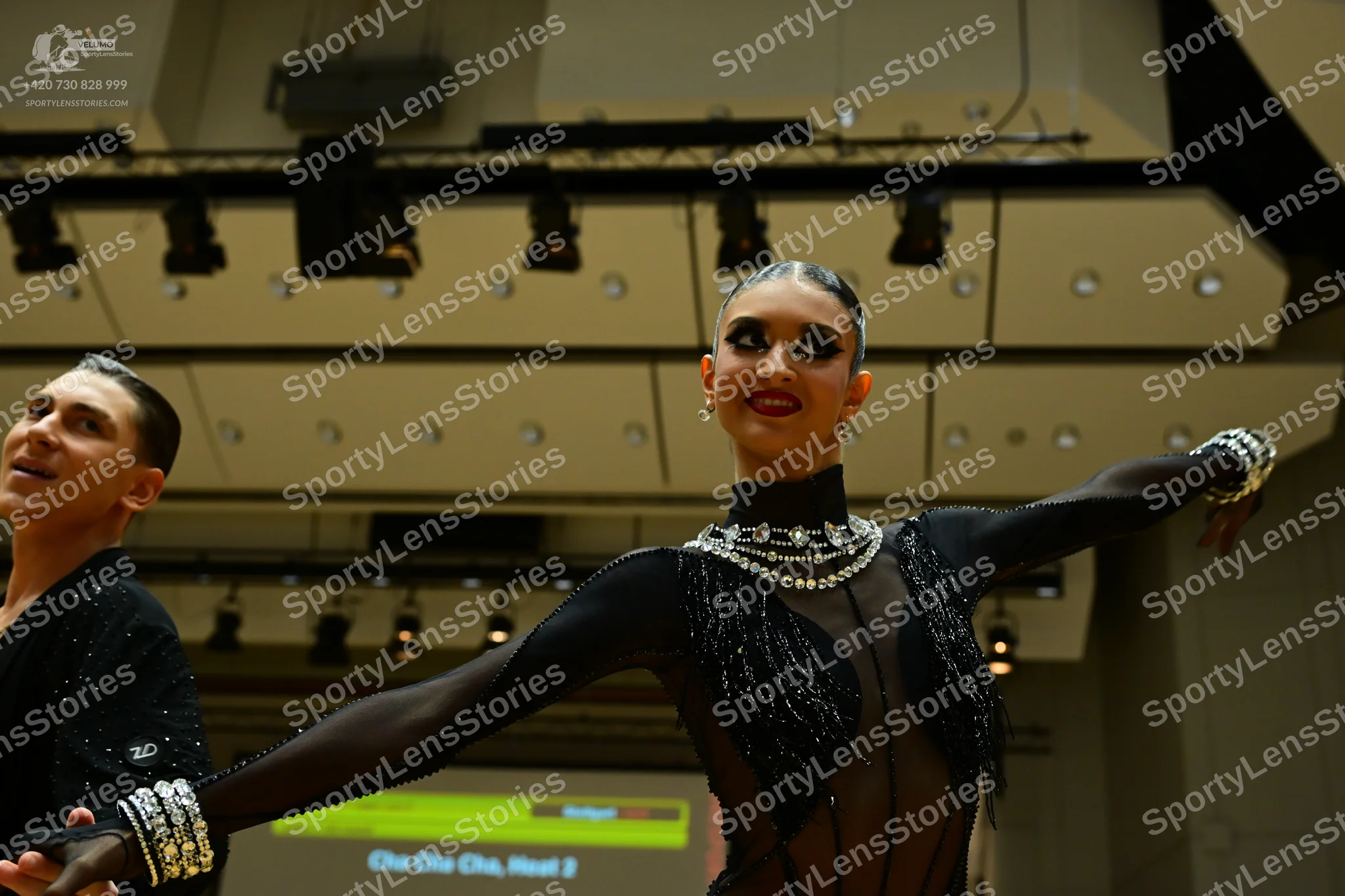 Dancesport competitor: Male dancer: black shirt with subtle sequins
