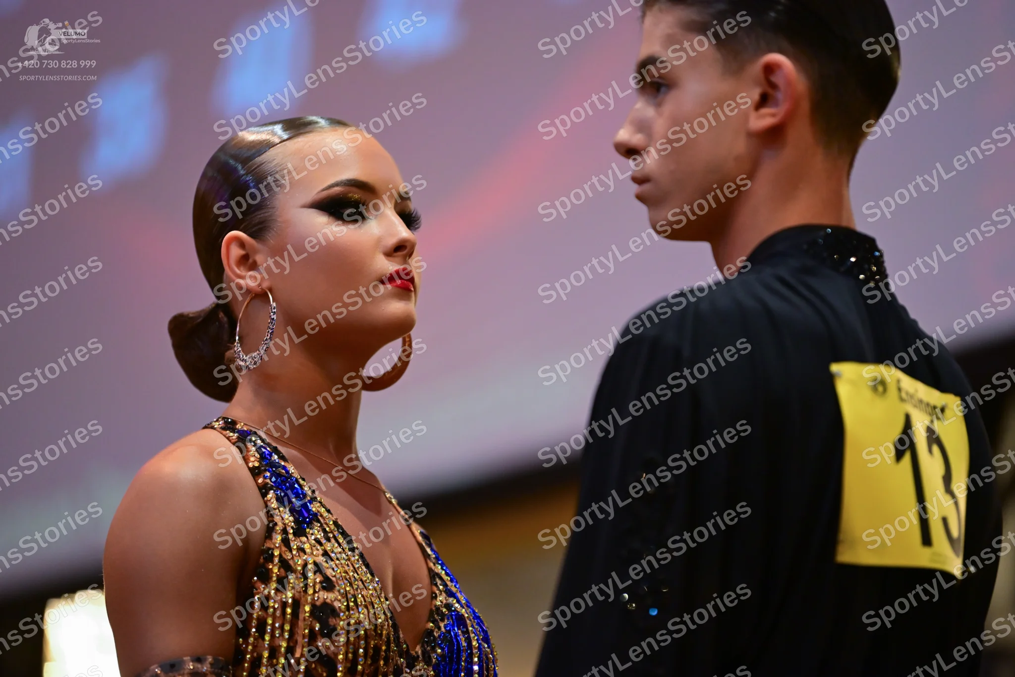 Dancesport competitor #13: Male dancer: black long-sleeved shirt with small sequins