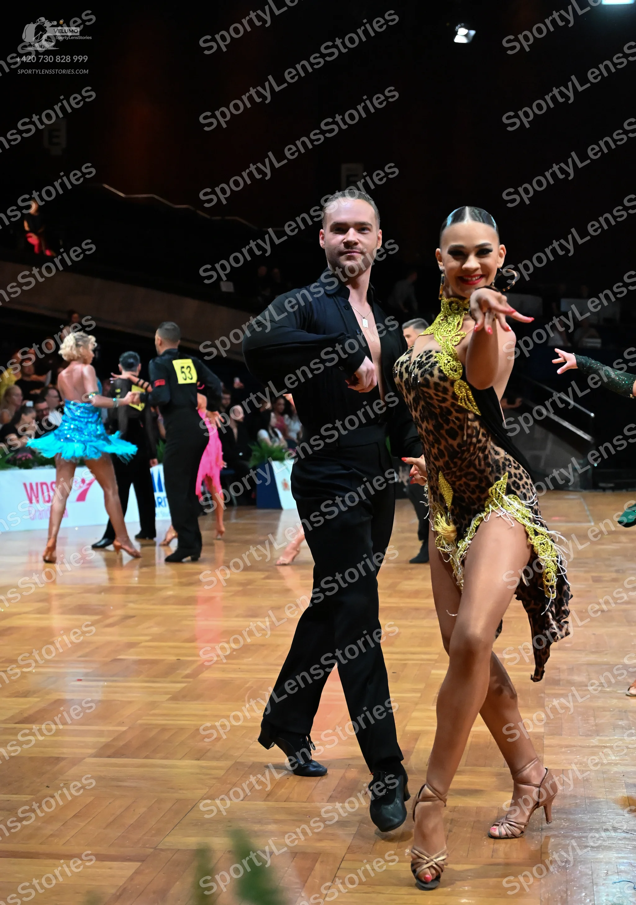 Dancesport competitor #53: Male dancer: black long-sleeved shirt and black trousers
